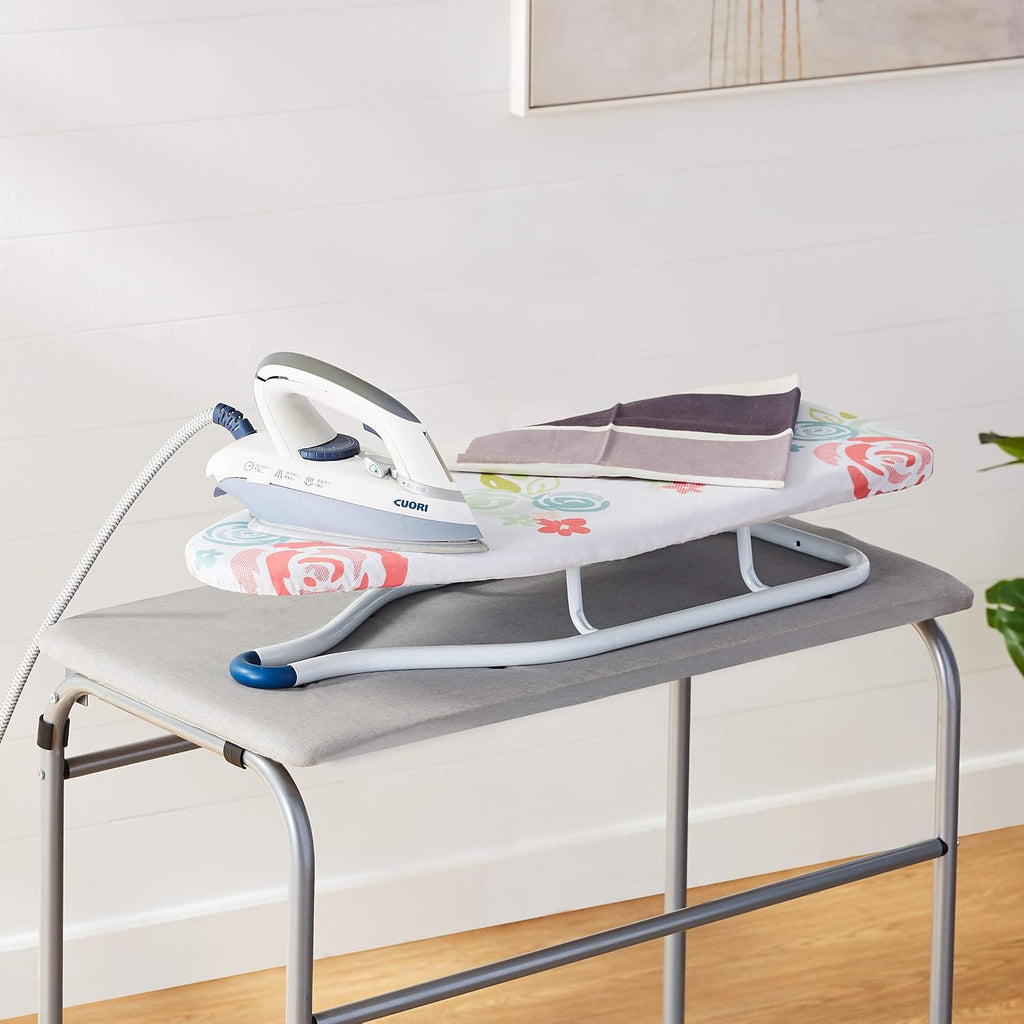 Amazon Basics Foldable Space Saving Ironing Board Tabletop with Non-Slip Feet, 77x29 cm, White, Floral
